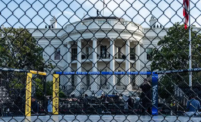 Members of the media view the arena for the UFC Freedom 250 fights on the South Lawn of the White House, Thursday, June 11, 2026, in Washington. (AP Photo/Alex Brandon)