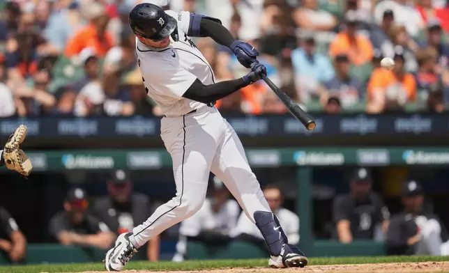 Detroit Tigers' Dillon Dingler hits a home run against the Chicago White Sox during the seventh inning of a baseball game Saturday, June 20, 2026, in Detroit. (AP Photo/Paul Sancya)