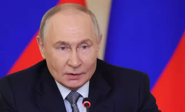 Russian President Vladimir Putin chairs a meeting on the development of Russia's domestic aviation industry at the Gromov Flight Research Institute in Zhukovsky, outside Moscow, Wednesday, June 24, 2026. (Mikhail Metzel, Sputnik, Kremlin Pool Photo via AP)