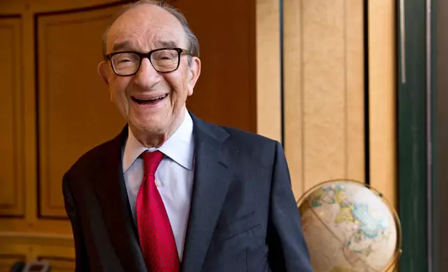 FILE - Economist Alan Greenspan, chairman of the Federal Reserve from 1987 to 2006, is seen in his office in Washington, Friday, Oct. 18, 2013. (AP Photo/J. Scott Applewhite, file)