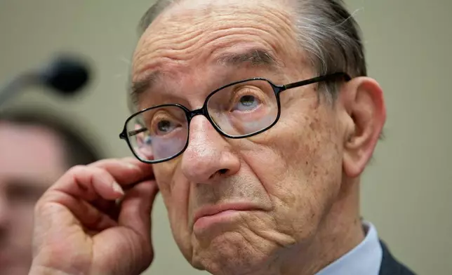 FILE - Former Federal Reserve Chairman Alan Greenspan testifies on Capitol Hill in Washington, Wednesday, April 7, 2010, before the Financial Crisis Inquiry Commission (FCIC) hearing examining the causes of the collapse of major financial institutions caused by subprime lending. (AP Photo/J. Scott Applewhite, file)