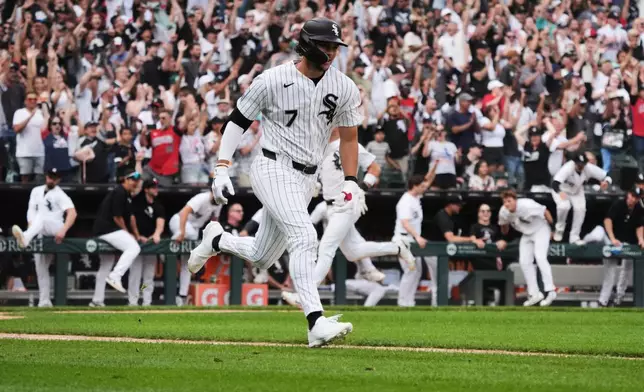 Chicago White Sox's Jacob Gonzalez runs after hitting a walkoff single against the Kansas City Royals during the ninth inning of a baseball game Saturday, June 27, 2026, in Chicago. (AP Photo/David Banks)