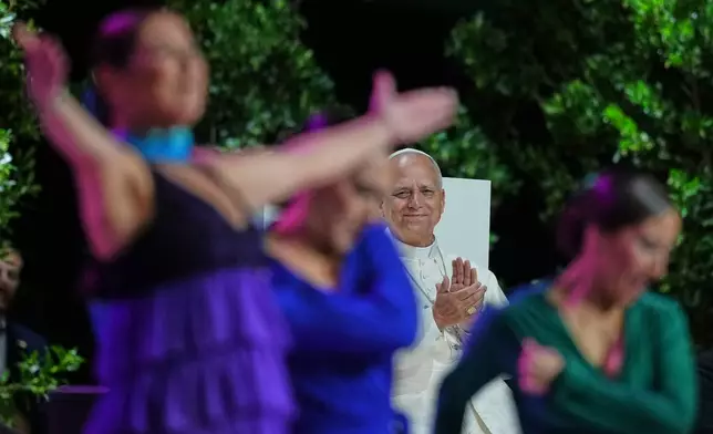 Spanish Flamenco dancers perform for Pope Leo XIV during the meeting "Building networks with the world of culture, art, economy and sport" at the Movistar Arena in Madrid, Spain, Sunday, June 7, 2026 (AP Photo/Alessandra Tarantino)