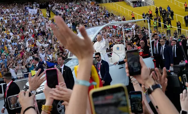 Pope Leo XIV arrives to attend a prayer vigil at Lluis Companys Olympic Stadium in Barcelona, Spain, Tuesday, June 9, 2026. (AP Photo/Bernat Armangue)