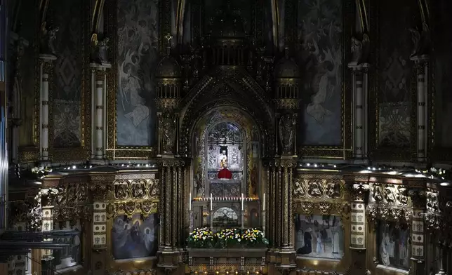 Pope Leo XIV leads a rosary prayer at the Abbey of Our Lady of Montserrat, in Montserrat, Spain, Wednesday, June 10, 2026. (AP Photo/Alessandra Tarantino)