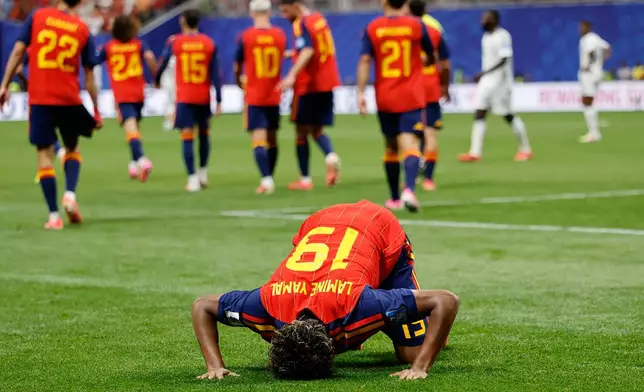 Spain's Lamine Yamal celebrates after scoring his side's opening goal during the World Cup Group H soccer match between Spain and Saudi Arabia in Atlanta, Sunday, June 21, 2026. (AP Photo/Erik S.Lesser)