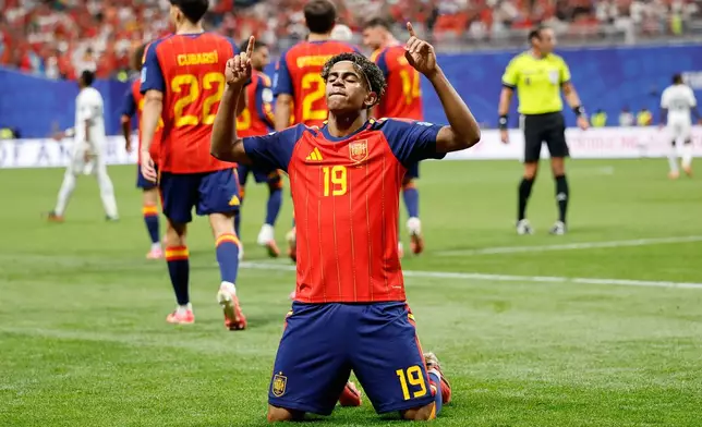Spain's Lamine Yamal celebrates after scoring his side's opening goal during the World Cup Group H soccer match between Spain and Saudi Arabia in Atlanta, Sunday, June 21, 2026. (AP Photo/Erik S.Lesser)