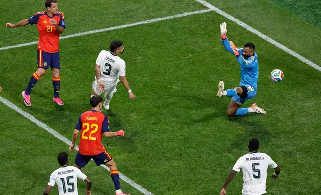 Spain's Mikel Oyarzabal, top left, scores his side's second goal against Saudi Arabia during the World Cup Group H soccer match in Atlanta, Sunday, June 21, 2026. (AP Photo/Butch Dill)