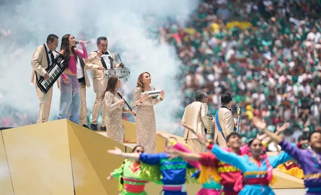 Mexican singer Belinda performs before the start of the World Cup Group A soccer match between Mexico and South Africa in Mexico City, Thursday, June 11, 2026. (AP Photo/Natacha Pisarenko)