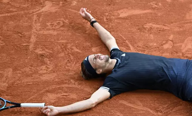Germany's Alexander Zverev reacts after winning the final tennis match against Italy's Flavio Cobolli at the French Open in Paris, Sunday, June 7, 2026. (AP Photo/Emma Da Silva)