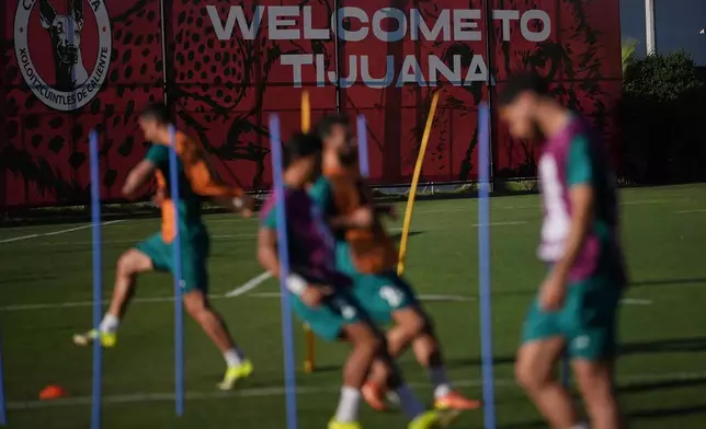 Players for Iran participate in a training session ahead of their team's World Cup Group G soccer match against Belgium Tuesday, June 16, 2026, in Tijuana, Mexico. (AP Photo/Gregory Bull)