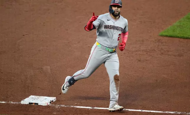 Washington Nationals' Luis Garcia Jr. celebrates as he rounds the bases after hitting a solo home run during the fifth inning of a baseball game against the Baltimore Orioles, Saturday, June 27, 2026, in Baltimore. (AP Photo/Nick Wass)