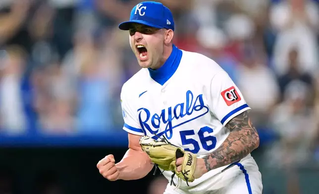 Kansas City Royals' Alex Lange celebrates after a baseball game against the Texas Rangers, Tuesday, June 9, 2026, in Kansas City, Mo. (AP Photo/Charlie Riedel)
