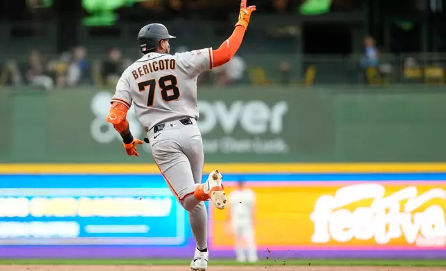 San Francisco Giants' Victor Bericoto gestures as he rounds the bases after hitting a solo home run during the fifth inning of a baseball game against the Milwaukee Brewers, Wednesday, June 3, 2026, in Milwaukee. (AP Photo/Aaron Gash)