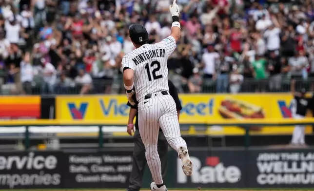 Chicago White Sox's Colson Montgomery celebrates as he rounds the bases after hitting a solo home run during the seventh inning of a baseball game against the Detroit Tigers in Chicago, Sunday, May 31, 2026. (AP Photo/Nam Y. Huh)