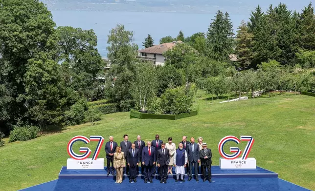 From left, European Council President Antonio Costa, Italian Prime Minister Giorgia Meloni, South Korea's President Lee Jae Myung, Egyptian President Abdel-Fattah el Sissi, British Prime Minister Keir Starmer, U.S. President Donald Trump, Kenya's President William Ruto, French President Emmanuel Macron Japan's Prime Minister Sanae Takaichi, India's Prime Minister Narenda Modi, Canadian Prime Minister Mark Carney, German Chancellor Friedrich Merz, European Commission President Ursula von der Leyen and Brazil's President Luiz Inacio Lula da Silva pose during a group photo of G7 leaders and invited nations during the G7 summit in Evian-les-Bains, France, Tuesday, June 16, 2026. (Dominique Jacovides, Pool Photo via AP)