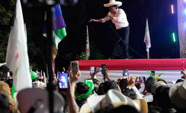 Presidential candidate Roberto Sanchez of Together for Peru party addresses supporters during his closing campaign rally in Lima, Peru, Thursday, June 4, 2026. (AP Photo/Martin Mejia)