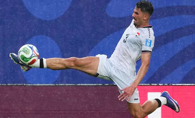 Iraq's Hussein Ali (3) kicks the ball during the World Cup Group I soccer match between France and Iraq in Philadelphia, Monday, June 22, 2026. (AP Photo/Petr David Josek)