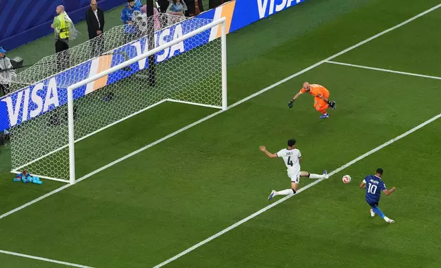 France's Kylian Mbappe (10) scores his side's second goal during the World Cup Group I soccer match between France and Iraq in Philadelphia, Monday, June 22, 2026. (AP Photo/Matt Rourke)