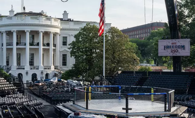 Members of the media view the arena for the UFC Freedom 250 fights on the South Lawn of the White House, Thursday, June 11, 2026, in Washington. (AP Photo/Alex Brandon)