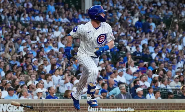 Chicago Cubs' Pete Crow-Armstrong watches his solo home run during the first inning of a baseball game against the Colorado Rockies in Chicago, Monday, June 15, 2026. (AP Photo/Nam Y. Huh)