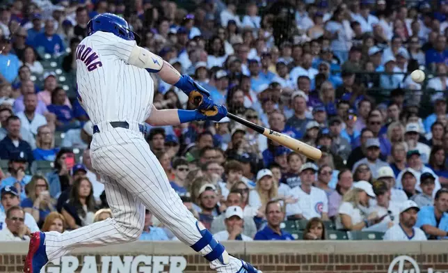 Chicago Cubs' Pete Crow-Armstrong hits a solo home run during the first inning of a baseball game against the Colorado Rockies in Chicago, Monday, June 15, 2026. (AP Photo/Nam Y. Huh)