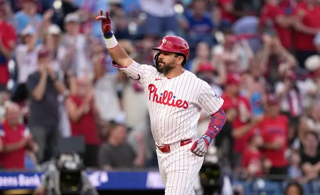 Philadelphia Phillies' Kyle Schwarber reacts after hitting a home run against Miami Marlins pitcher Tyler Phillips during the fourth inning of a baseball game Tuesday, June 16, 2026, in Philadelphia. (AP Photo/Matt Slocum)