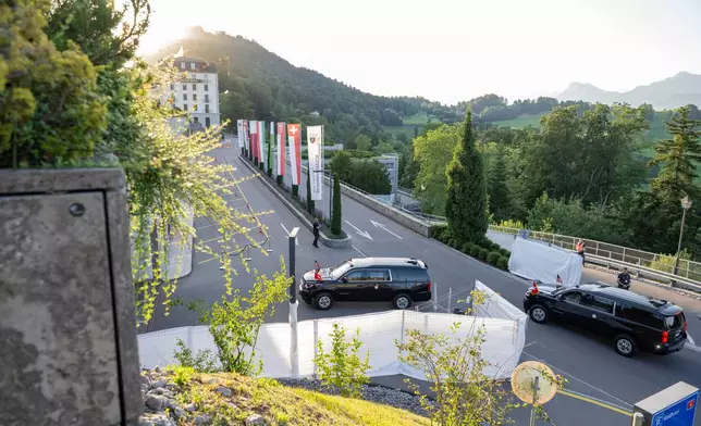 A convoy with U.S. Vice President JD Vance arrives at the Bürgenstock Resort in Obbuergen, near Lucerne, in Switzerland Sunday, June 21, 2026. (Urs Flueeler/Keystone, Pool Photo via AP)
