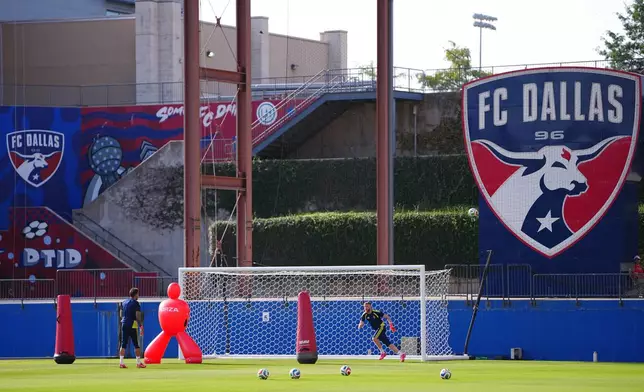 Sweden goalkeeper Kristoffer Nordfeldt, left, and Sweden goalkeeper Viktor Johansson participate in a training session ahead of their World Cup Group F soccer match against Japan, Wednesday, June 24, 2026, in Frisco, Texas. (AP Photo/Julio Cortez)