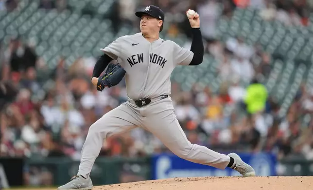 New York Yankees pitcher Ryan Weathers throws against the Detroit Tigers during the first inning of a baseball game Wednesday, June 24, 2026, in Detroit. (AP Photo/Paul Sancya)