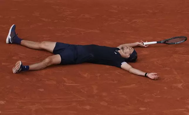 Germany's Alexander Zverev reacts after winning the final tennis match against Italy's Flavio Cobolli at the French Open in Paris, Sunday, June 7, 2026. (AP Photo/Thibault Camus)