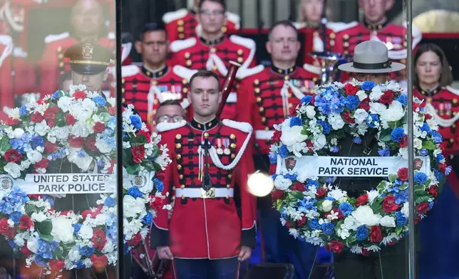 Wreaths honoring U.S. Park Police and the National Park Service are laid before President Donald Trump speaks at the opening of the Great American State Fair on the National Mall, Wednesday, June 24, 2026, in Washington. (AP Photo/Alex Brandon)