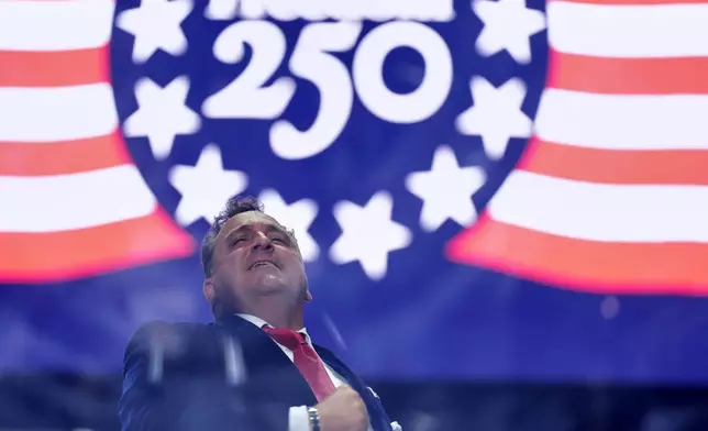 Christopher Maccihio sings before President Donald Trump speaks at the opening of the Great American State Fair on the National Mall, Wednesday, June 24, 2026, in Washington. (AP Photo/Alex Brandon)