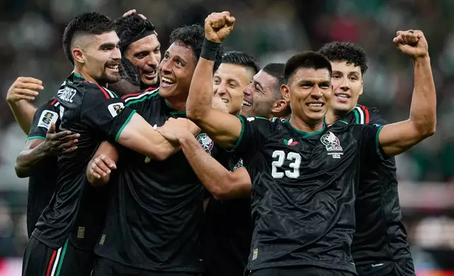 Mexico's Luis Romo, third left, celebrates with his teammates after scoring g his team's first goal during the World Cup Group A soccer match between Mexico and South Korea in Zapopan, near Guadalajara, Mexico, Thursday, June 18, 2026. (AP Photo/Natacha Pisarenko)