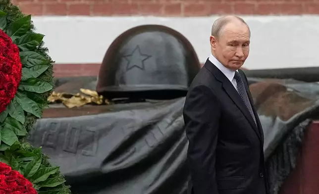 Russian President Vladimir Putin attends a wreath-laying ceremony marking the 85th anniversary of the Nazi German invasion into Soviet Union in World War II on the Remembrance and Sorrow Day at the Tomb of the Unknown Soldier by the Kremlin wall in Moscow, on Monday, June 22, 2026. (AP Photo/Alexander Zemlianichenko, Pool)