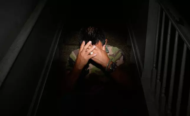 A person, who was detained at the Stewart Detention Center in Lumpkin, Ga., and did not wish to be identified, poses for a portrait, April 22, 2026, in Flowery Branch, Ga. (AP Photo/Brynn Anderson)