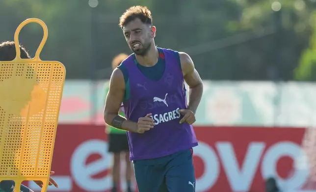 Portugal's Bruno Fernandes runs during the men's national soccer team training session ahead of their FIFA World Cup soccer tournament Saturday, June 13, 2026, in Palm Beach Gardens, Fla. (AP Photo/Marta Lavandier)