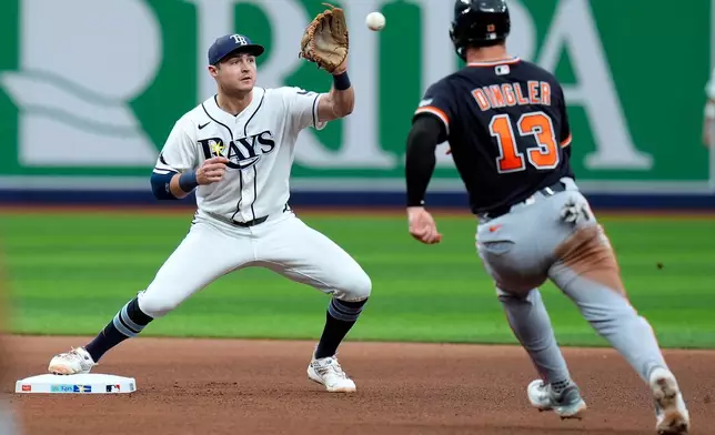 Tampa Bay Rays second baseman Ben Williamson forces Detroit Tigers' Dillon Dingler (13) at second base on a fielder's choice by Kerry Carpenter during the seventh inning of a baseball game Wednesday, June 3, 2026, in St. Petersburg, Fla. (AP Photo/Chris O'Meara)