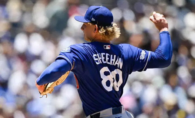 Los Angeles Dodgers pitcher Emmet Sheehan delivers during the first inning of a baseball game against the San Diego Padres, Sunday, June 28, 2026, in San Diego. (AP Photo/Denis Poroy)