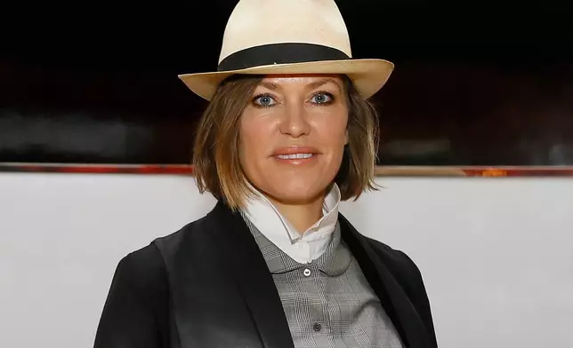 FILE - Welsh singer Cerys Matthews poses during a photocall to launch the inaugural Festival of Voice, in London, Thursday, Feb. 25, 2016. (AP Photo/Kirsty Wigglesworth, file)