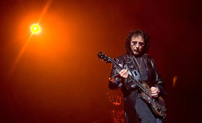 FILE - Tony Iommi of British heavy metal group 'Heaven and Hell' on stage during their concert in Oslo, Norway on Thursday June 4 2009. (AP Photo/ Terje Bendiksby, Scanpix )