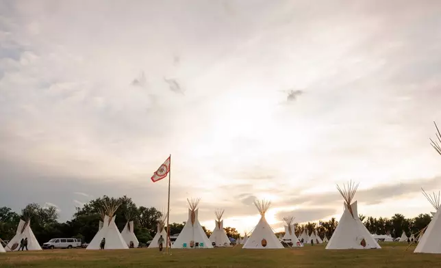 Tepees dot the campground during festivities commemorating the 150th anniversary of the Battle of the Little Bighorn, Wednesday, June 24, 2026, in Crow Agency, Mont. (AP Photo/Tailyr Irvine)
