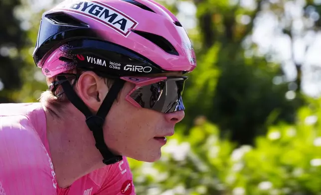 Overall leader Denmark's Jonas Vingegaard pedals during the last stage of the Giro d'Italia in Rome Sunday May 31, 2026. (Fabio Ferrari/LaPresse via AP)