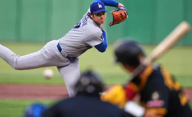 Los Angeles Dodgers' Shohei Ohtani delivers during the second inning of a baseball game against the Pittsburgh Pirates in Pittsburgh, Wednesday, June 10, 2026. (AP Photo/Gene J. Puskar)