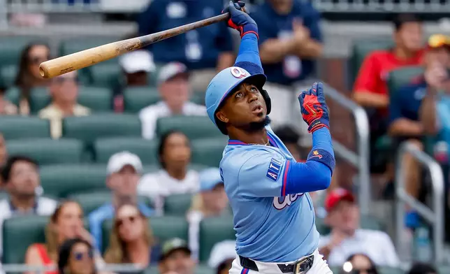Atlanta Braves' Ozzie Albies watches his winning two-run home run against the Milwaukee Brewers during the ninth inning of a baseball game, Saturday, June 20, 2026, in Atlanta. (AP Photo/Erik S. Lesser)
