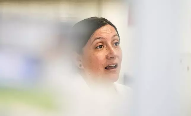 María Inés Barría, a virologist at the Universidad San Sebastián, gives an interview at the university, in Santiago, Chile, Wednesday, May 20, 2026. (AP Photo/Esteban Felix)
