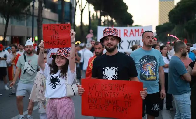 Protesters take part in a rally against a coastal development project in western Albania linked to President Donald Trump's son-in-law Jared Kushner, in Tirana, Albania, Saturday, June 27, 2026. (AP Photo/Hameraldi Agolli)