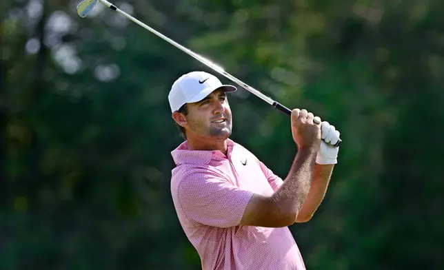 Scottie Scheffler hits off the fifth hole during the final round of the Travelers Championship golf tournament at TPC River Highlands, Sunday, June 28, 2026, in Cromwell, Conn. (AP Photo/Jessica Hill)