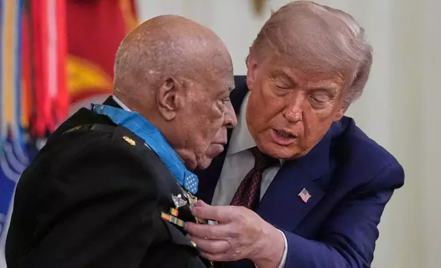 President Donald Trump presents the Medal of Honor to retired U.S. Marine Corps Maj. James Capers, Jr., during an East Room ceremony at the White House in Washington, Thursday, June 18, 2026 in Washington. (AP Photo/Manuel Balce Ceneta)