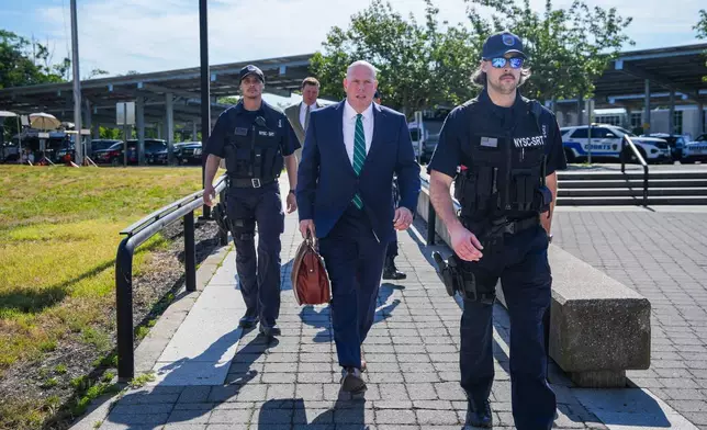 Defense Attorney for convicted murderer Rex Heuermann, Michael J. Brown, arrives to the the Arthur M. Cromarty Criminal Court Complex ahead Heuermann's court sentencing Wednesday, June 17, 2026, in Suffolk County, New York. (AP Photo/Ryan Murphy)
